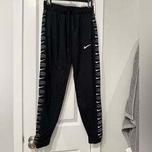 Nike Black Jogger Pants with Logo on sides.